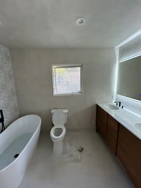 Master bathroom, level-5 finish, primer and Venetian plaster application 2026 project photo